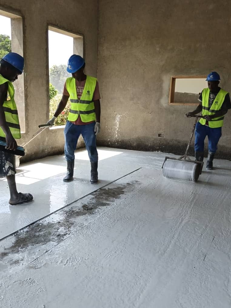 Floor placement and levelling in progress