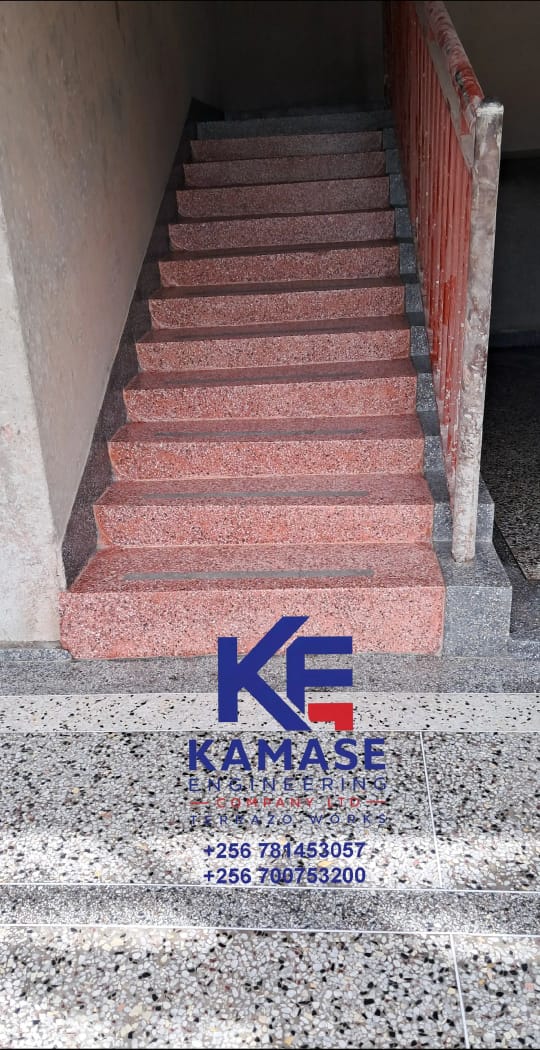 Red terrazzo staircase with dark border details